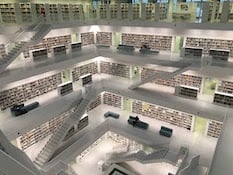 Photo of a large library's book stacks